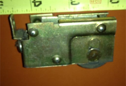 A customer submitted photo of a closet door roller.