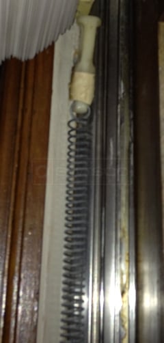 A customer submitted photo of a spring window balance.