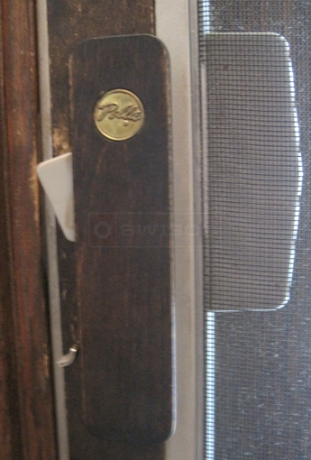 User submitted picture of Pella screen door handle and latch.