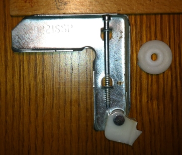 A customer submitted photo of a screen door roller.