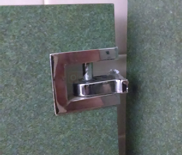 User submitted photos of lavatory partition hardware.