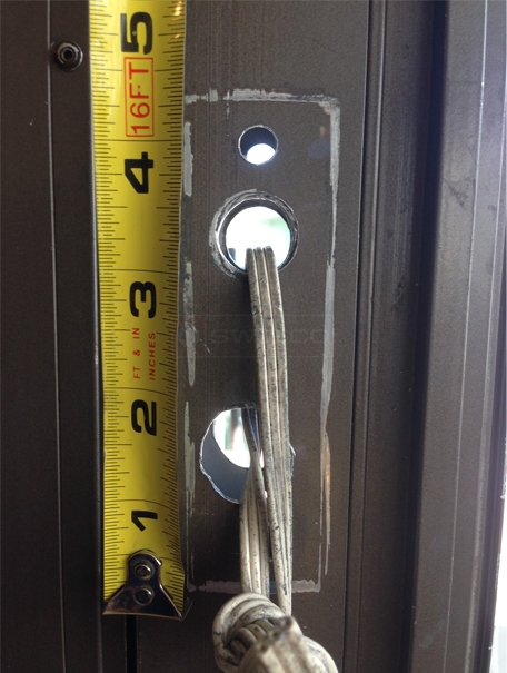 User submitted a photo of storm door hardware.