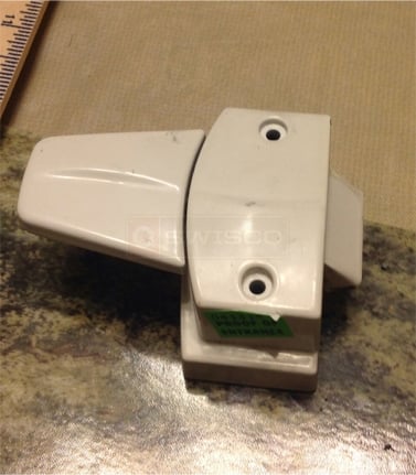 User submitted a photo of a storm door latch.