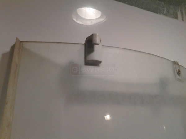 User submitted a photo of shower door hardware.
