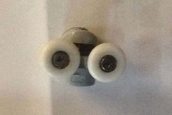 User submitted a photo of a shower door roller.