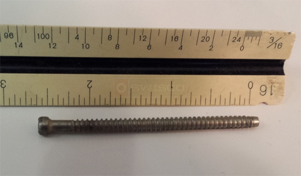 User submitted a photo of a patio screen door adjustment screw.