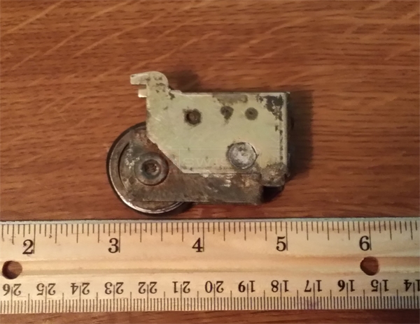 User submitted photos of a patio door roller.