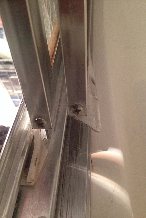 User submitted a photo of shower door hardware.