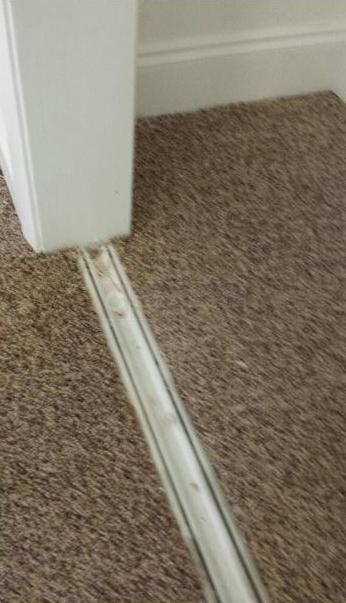 User submitted a photo of closet door track.