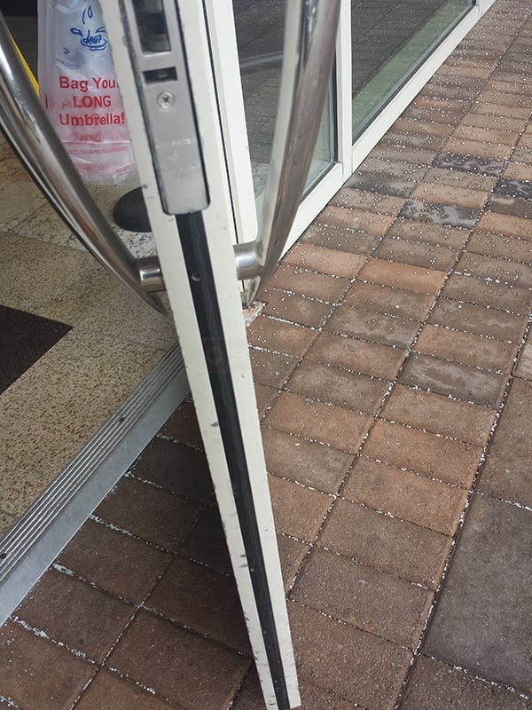 User submitted a photo of commercial door weatherstripping.