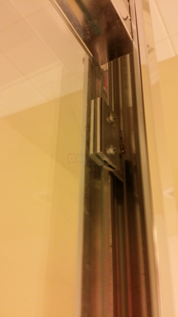 User submitted a photo of shower door hardware.