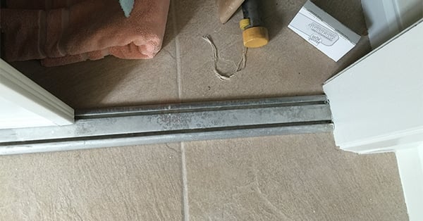 User submitted a photo of a closet door track.