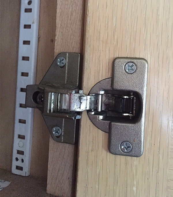 User submitted a photo of a cabinet hinge.