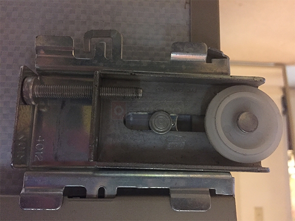 User submitted photos of a closet door roller.