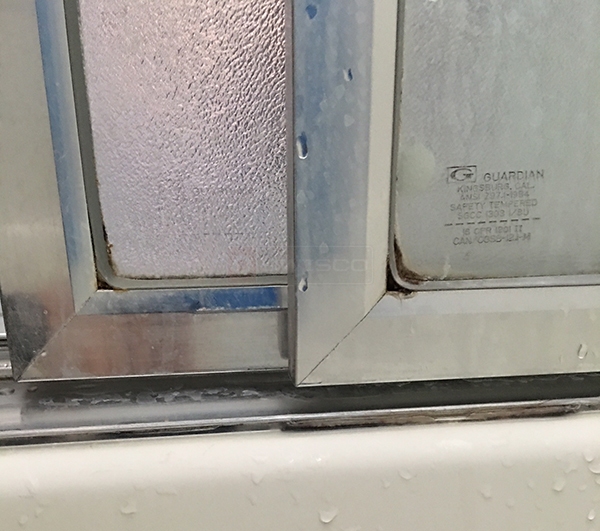 User submitted photos of shower door hardware.