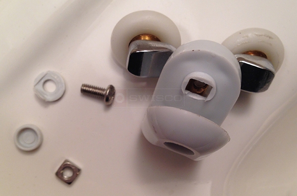 User submitted photos of shower door hardware.