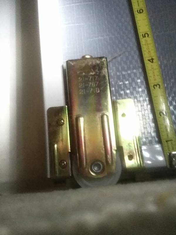 User submitted a photo of a closet door roller.