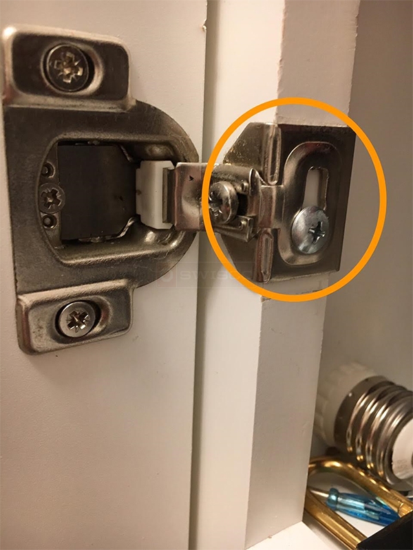 User submitted a photo of a cabinet hinge.