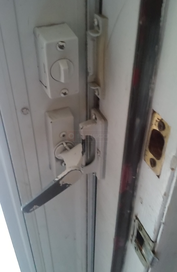 User submitted a photo of a storm door hardware.