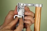 Reversing the thumb lock on the Swisco 82-013 Sliding Door Handle