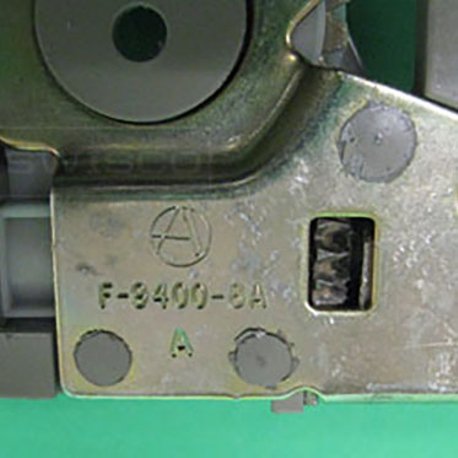 The stamp of F-9400-8A on the back of the 39-264 window operator.