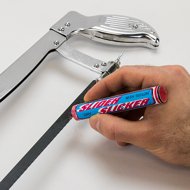 Slider Slicker being applied to a saw blade. 