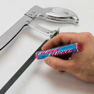 Slider Slicker being applied to a saw blade. 