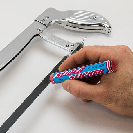 Slider Slicker being applied to a saw blade.
