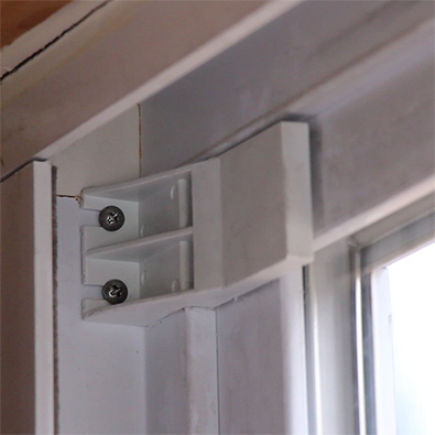 Example Of A Clip Holding The Stationary Door In The Frame