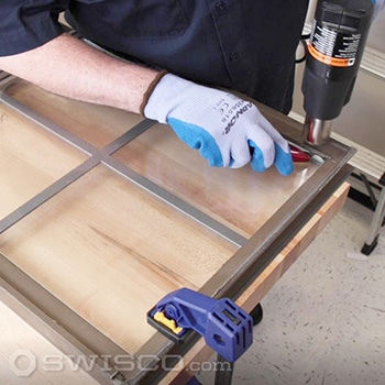 Loosen sealant with a heat gun