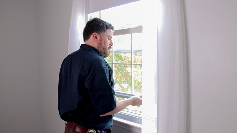 Lift the window sash.