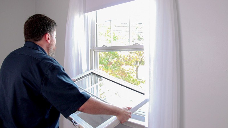 Rotate the window sash and pull.
