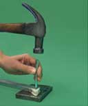 Punch the new rivet in the channel balance.