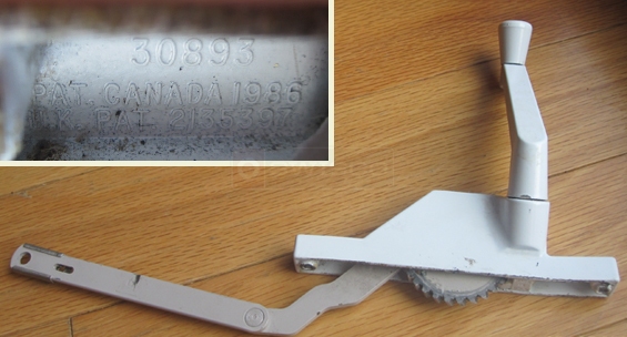 User submitted photo of window crank removed from window and stamp.