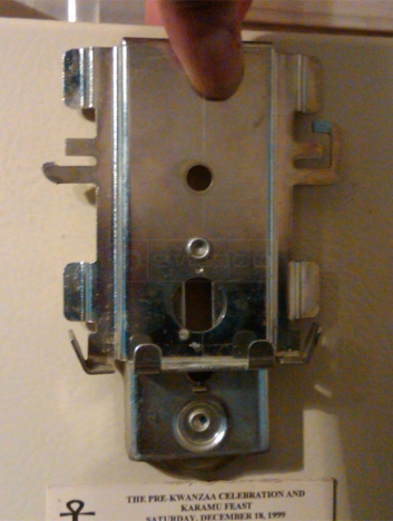 A customer submitted photo of a mirror door roller.