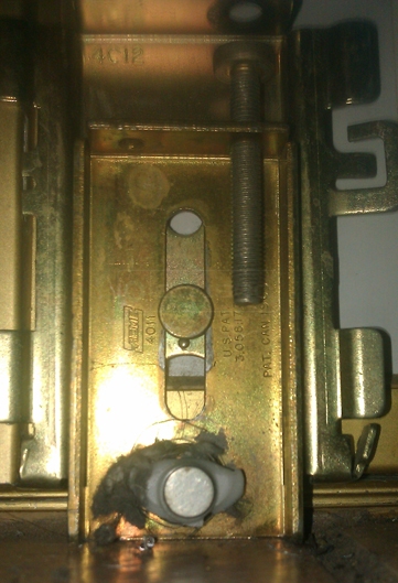 A customer submitted photo of a mirror door roller.