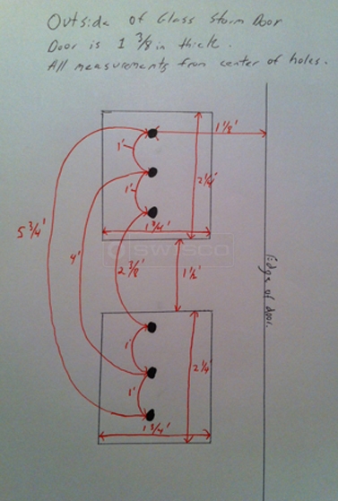 A customer submitted photo of their door handle measurements.