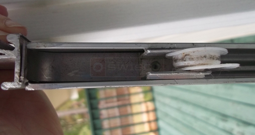 User submitted picture of sliding screen door roller.