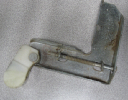 A customer submitted photo of a screen door roller.