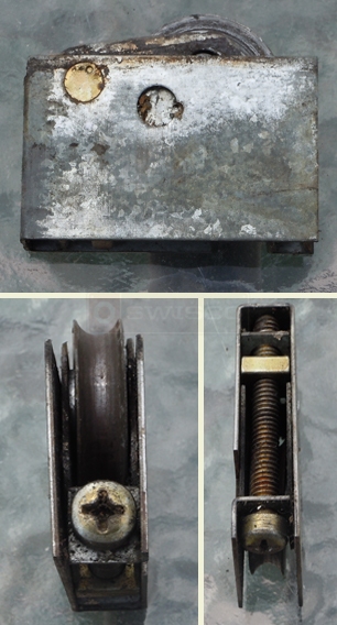 A customer submitted photo of a door roller.