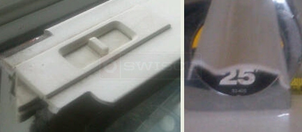 A customer submitted photo of a window lock and glazing.