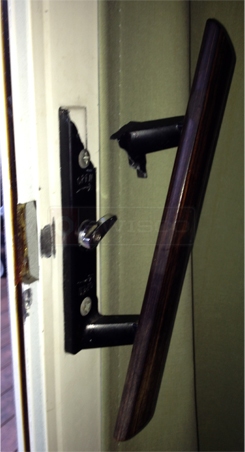 A customer submitted photo of a sliding door handle set.
