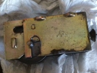 A customer submitted photo of a door roller.