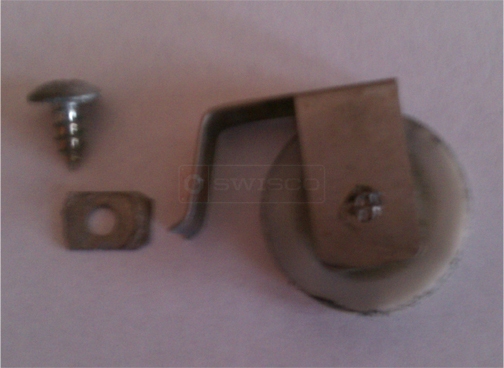 A customer submitted photo of a screen door wheel.
