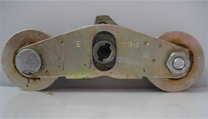 A customer submitted photo of a door roller.