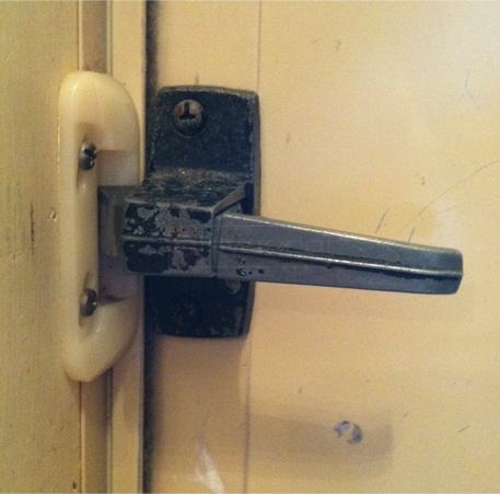 A customer submitted image of their storm door tilt latch.