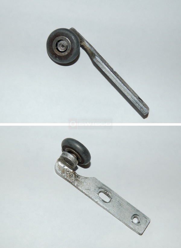 User submitted photos of a pocket door roller.