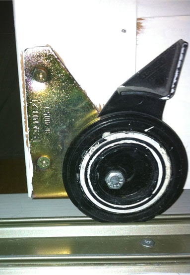 A customer submitted image of their closet sliding roller.