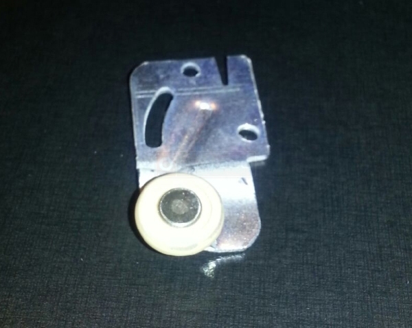 User submitted a photo of a closet door roller.