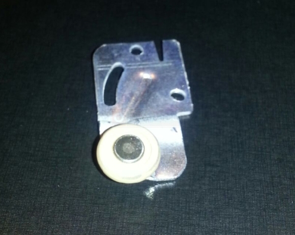 User submitted a photo of a closet door roller.